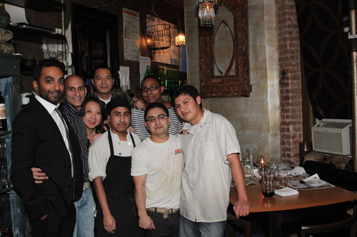 Actor Manu Narayan, Chef Jehangir Mehta and the staff of Graffiti in New York on November 15, 2012. Photo by Lia Chang